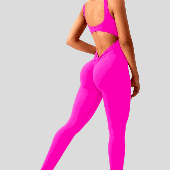 Bright pink sleeveless jumpsuit featuring a V-shaped scrunch back design, ideal for fitness activities.